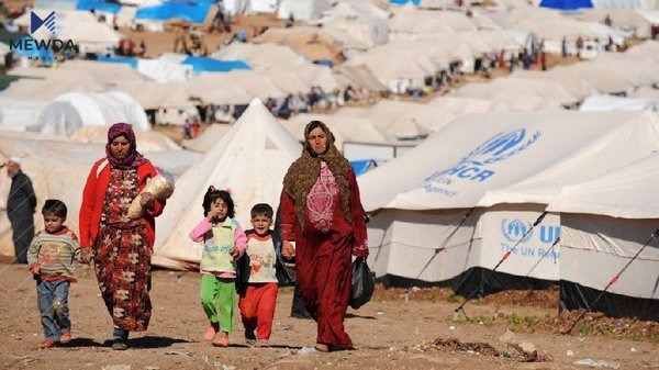 ئاوارەکان لە رۆژی دەنگدانی تایبەت دەنگدەدەن