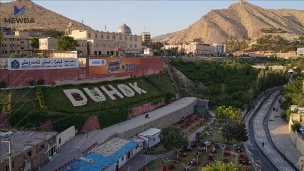 لە دهۆک کچ و کوڕێک تەقە لە شوقەیەک دەکەن