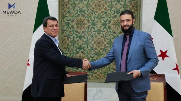 مەزڵوم عەبدی و ئەحمەد شەرع لە کۆبوونەوەدان